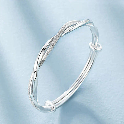 Twisted Silver Bangle Bracelet | Elegant & Timeless Design