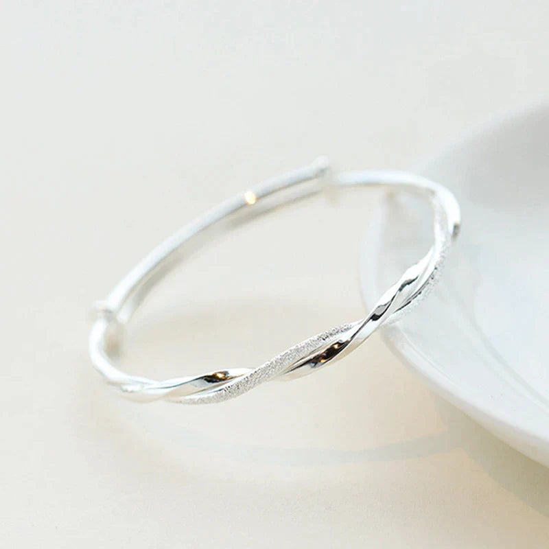 Twisted Silver Bangle Bracelet | Elegant & Timeless Design