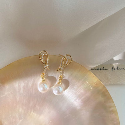 Golden Shell Pearl & Cubic Zirconia Knot Dangling Earrings – Sterling Silver