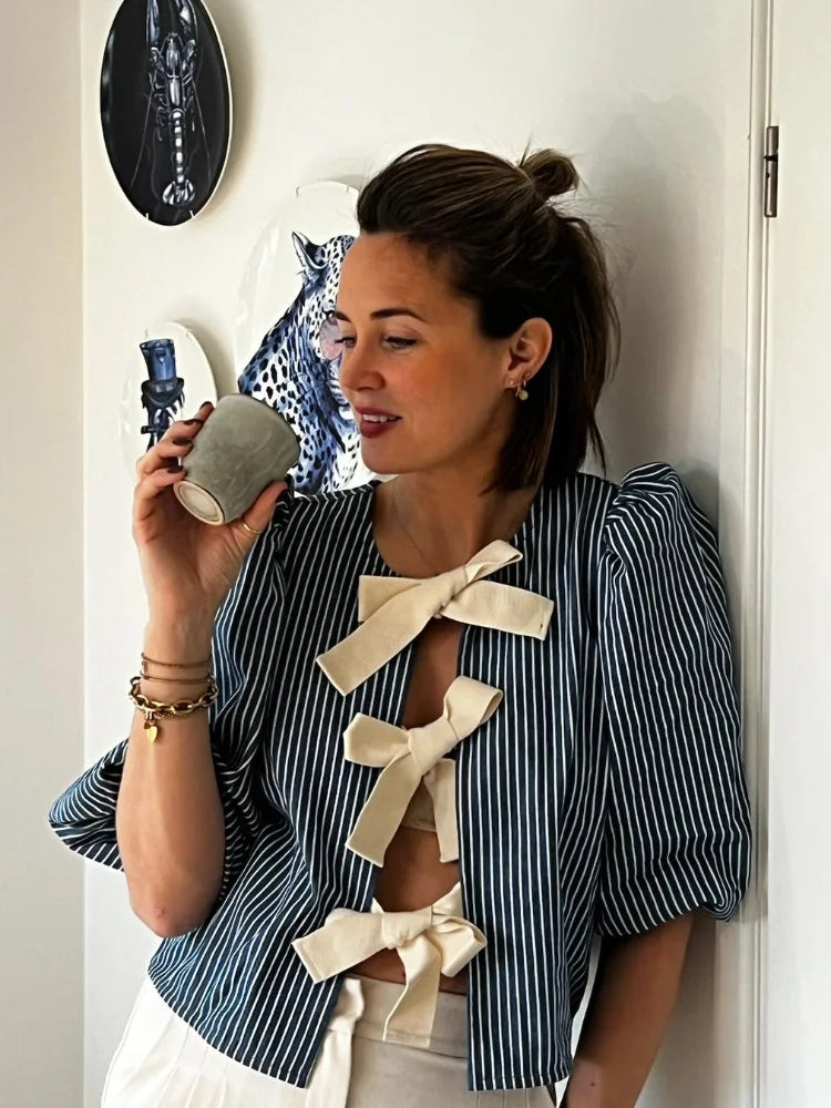 Elegant Blue Striped Bow Top - Perfect For Any Occasion!